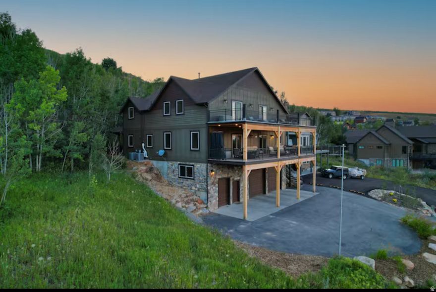 "Spectacular Views of Bear Lake!* 2 huge decks facing the lake. Covered patio with a hot tub surrounded by a grove of aspen trees in the back. Year round access with paved road. 3 En-suite bedrooms plus 3 additional bedrooms, top of the line appliances, and many more. Home is being sold furnished with a few exclusions. This is a great family home or investment property for nightly rentals. Sleeps up to 22 comfortably and plenty of room for more if needed.