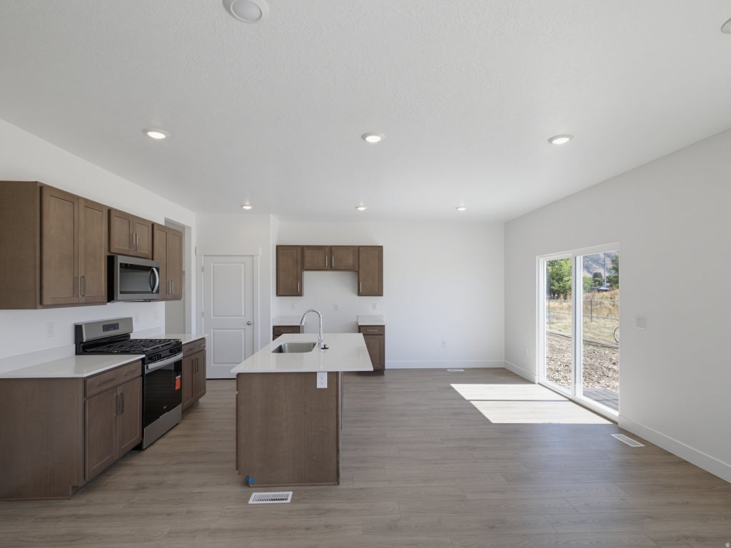 Photo of 1672 N OLD LOON AVE #107, Tooele, UT 84074 (MLS # 2185698)