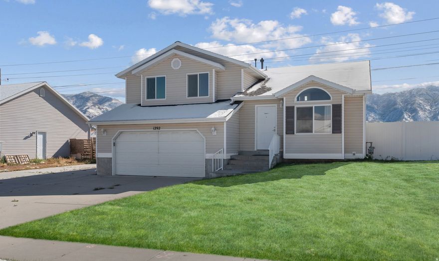 Located in a quiet, well-established neighborhood, this beautiful multi level home offers comfort, space, and stunning mountain views. With 4 bedrooms and 3 full bathrooms, there's room for everyone to relax and enjoy. The layout connects the living and dining areas seamlessly, perfect for both daily living and entertaining. Step outside onto the large deck, ideal for gatherings with a convenient electric outlet for lighting or outdoor cooking. Extra storage space in the crawl area keeps belongings organized and out of sight. Located just minutes from shopping, dining, and everyday conveniences, this home combines peaceful surroundings with modern accessibility. Experience the perfect balance of tranquility and practicality in your next home.  * The jets in the 6 ft  tub in the lower level do not work. *