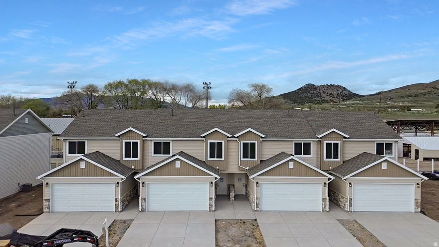 Now is your opportunity to own a brand-new townhome in Cedar Ridge, with completion set for April 2026. Located in Malad, Idaho, just minutes from the fairgrounds, this home offers beautiful mountain views and a convenient location near I-15, schools, grocery stores, and everyday essentials. Thoughtfully designed with modern finishes, it features quartz countertops and stylish accent walls. Whether you're looking for a smart investment or a place to call home, this property offers the perfect blend of comfort, style, and convenience. Schedule your showing today