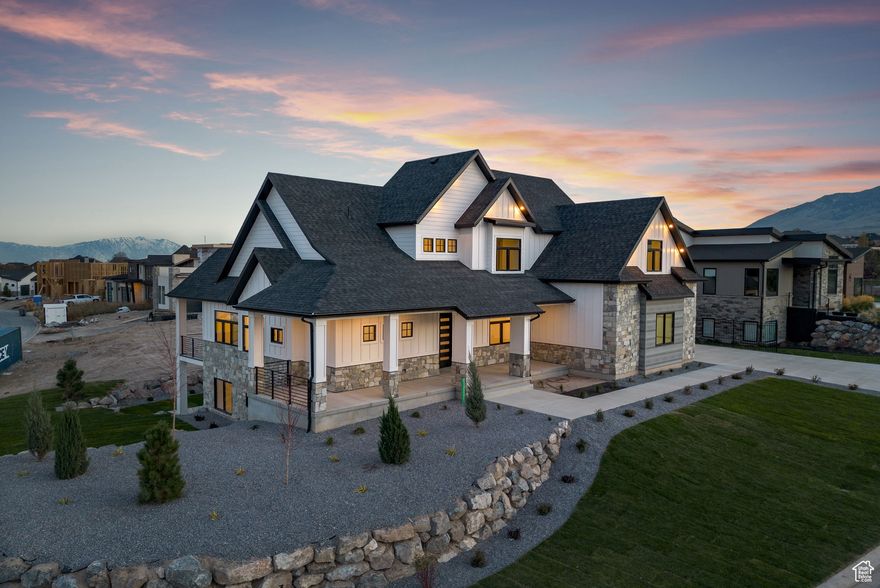 Lakeside Luxury At Its Finest!!! Experience a life of comfort and style in this beautifully crafted luxury home that leaves nothing to be desired. Featuring spacious open areas, soaring ceilings, and elegant artistic finishes, it's fully equipped with every convenience. A large theater room with a snack area makes it ideal for both lively gatherings and cozy evenings in. Multiple flexible spaces throughout the home provide the versatility to adapt to your unique lifestyle needs. Set within an exclusive resort community, this home offers breathtaking views and premium amenities that bring sophistication and joy to everyday living.  Square footage figures are provided as a courtesy estimate only and were obtained from county records.  Buyer is advised to obtain an independent measurement.