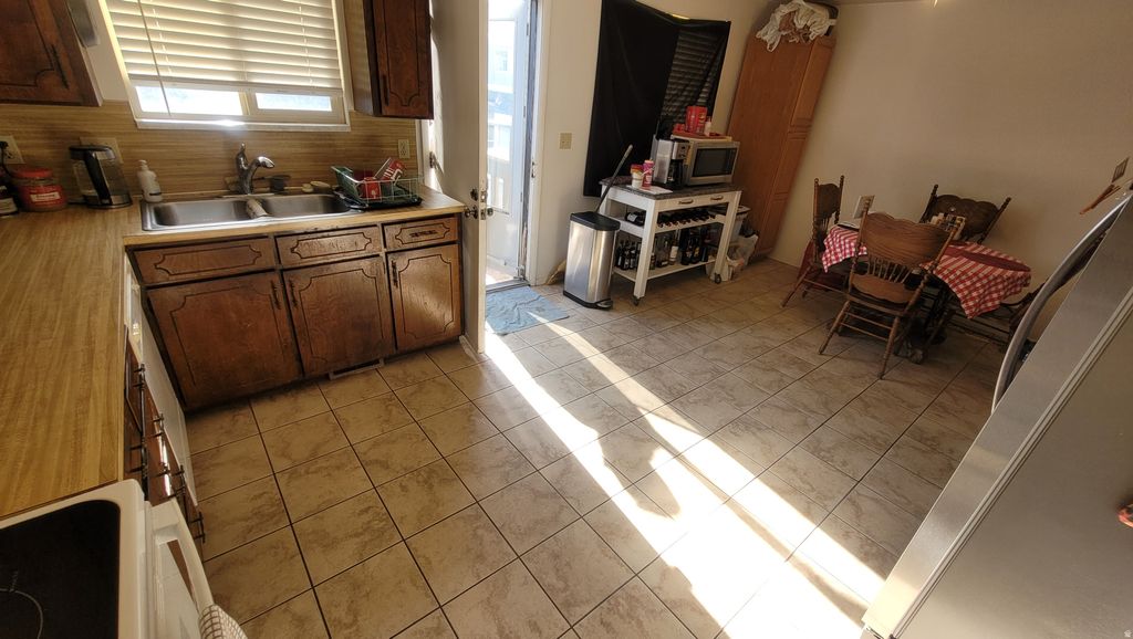 Photo of 5481 W CYCLAMEN CT S, West Jordan, UT 84081 (MLS # 2130359)