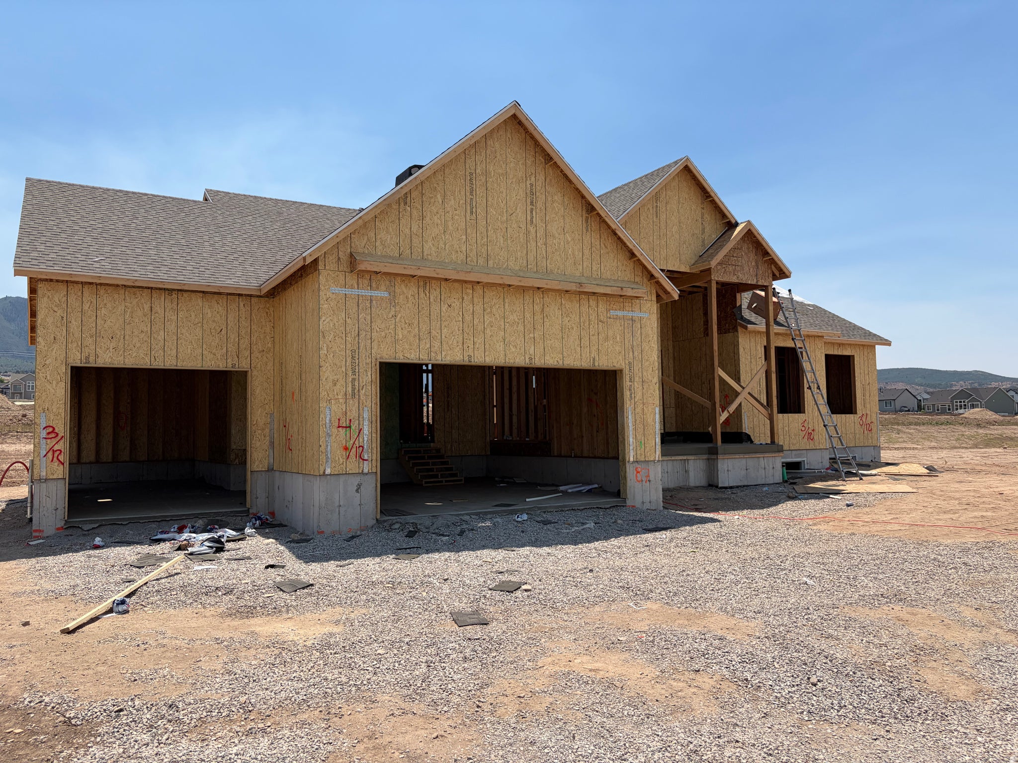 New construction opportunity featuring a multi-car garage, durable roof shingles, and a covered entry porch