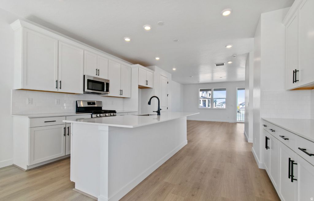 Photo of 6351 W W PYRAMID PEAK LN #120, Herriman, UT 84096 (MLS # 2156362)