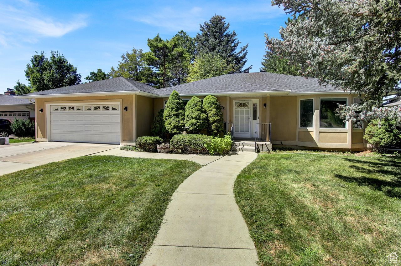Move-in Ready~ well-built and well-maintained rambler located in a beautiful neighborhood near Lundstrom Park. This property featured a newly upgraded roof, kitchen, and basement, making it move-in ready. With two Kitchens and two Laundries, it offers great versatility, including a mother-in-law apartment with a separate entrance. The nicely landscaped backyard is perfect for outdoor gatherings and relaxation. Don't miss the opportunity to own this gem in a neat and desirable area!