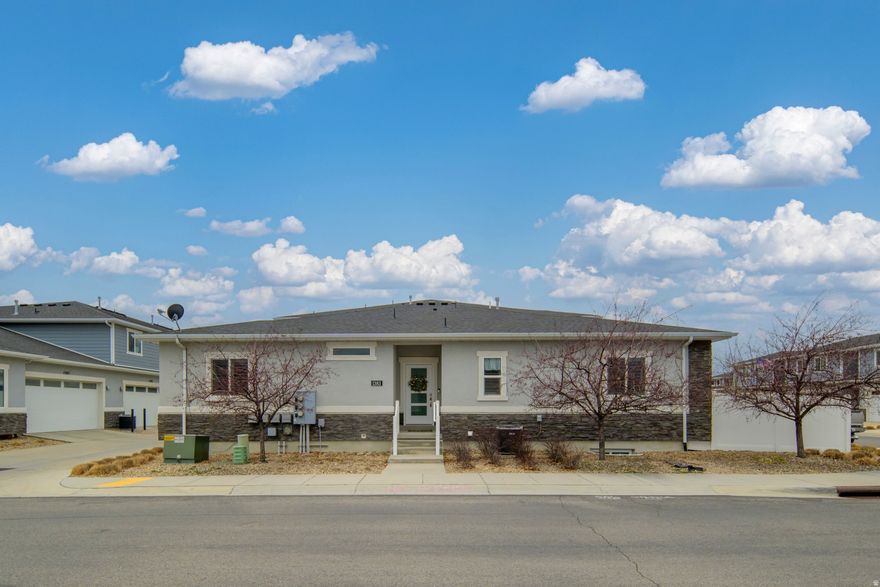 ***Single Level Living at it's Best! *** Beautiful and spacious Rambler Townhome filled with natural light throughout. The main level offers a primary bedroom, an additional bedroom, two bathrooms, and a laundry area. The kitchen is designed for both style and functionality, featuring stainless steel appliances, quartz countertops, a large island with seating and a separate dining area; perfect for everyday living and entertaining.  Downstairs, you'll find an additional bedroom, bathroom, second laundry room and a bonus room-ideal for guests or multi-generational living. Enjoy thoughtful upgrades including plantation shutters throughout and extra-wide hallways and stairways for enhanced accessibility. End unit, spacious fenced patio area with yard/grass area. Park View Villas is a wonderful well kept community. Maintenance-Free!  HOA fees cover snow removal, exterior maintenance, and water-making for low-maintenance, worry-free living.