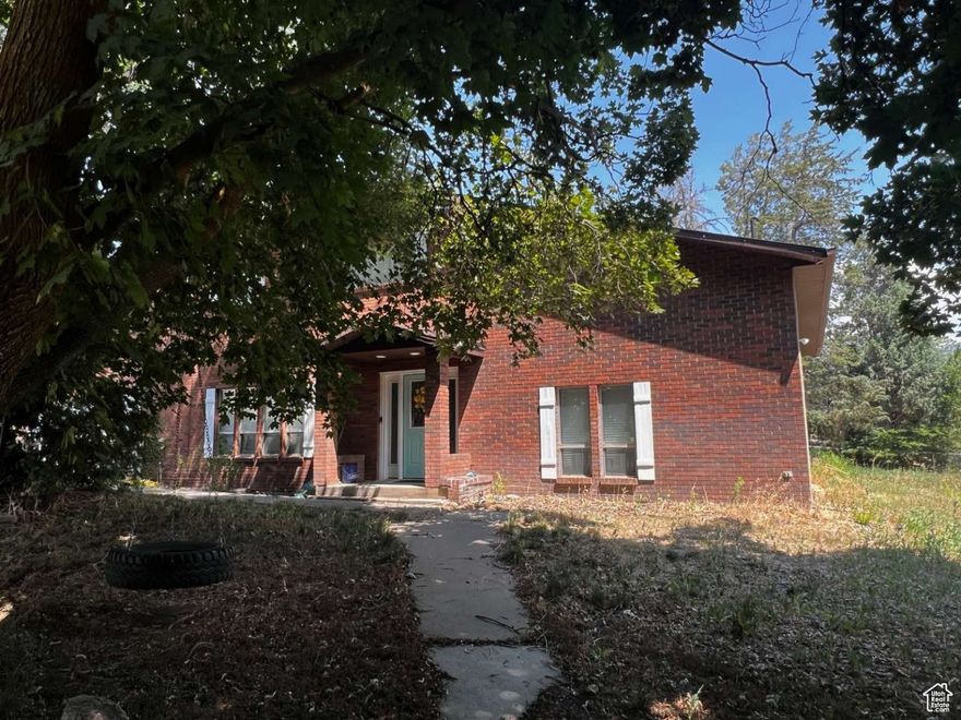 This structurally sound home in Pleasant View is ready for your personal touch. It features a spacious 4-car garage (2 wide, 2 deep) and a mostly finished basement, offering ample space for vehicles, storage, or hobbies. The home is equipped with two working gas-powered furnaces and two AC units, ensuring year-round comfort. While the house has been well-maintained with no urgent repairs needed, it presents a wonderful opportunity for cosmetic modernization to match your style. The roof is in good condition, and the property's strong bones provide a fantastic canvas for your dream home.