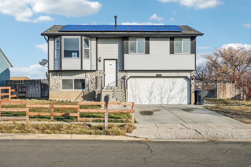 OPEN HOUSE SATURDAY JANUARY 24TH FROM 11-2.  Come see this great home on an established street in Magna! LVP flooring, newer carpet, tile, quarts counter tops, and stainless steel appliances. Hang out on the covered deck and watch the kids and animals play in the large terraced back yard.