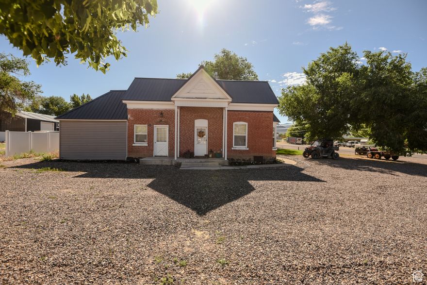 Great price for income potential and dual zoned commercial/residential home on Beaver's Main Street! 3 bedroom, 2 bath newly remodeled brick home with new roof, windows, flooring and more! Main street frontage! Many different possibilities with this property!