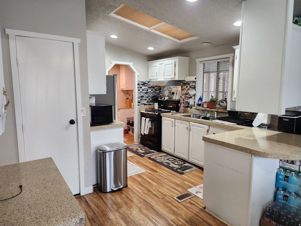 Photo of 1142 W BARBERRY DR S #56, Taylorsville, UT 84123 (MLS # 2141739)