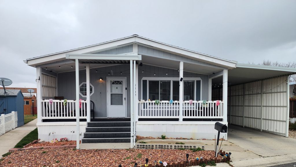 Photo of 1142 W BARBERRY DR S #56, Taylorsville, UT 84123 (MLS # 2141739)