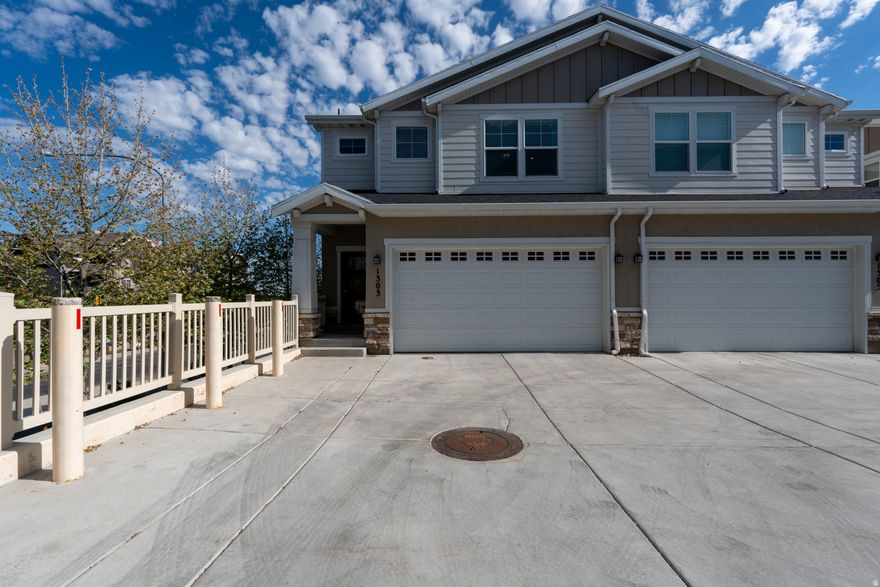 A Beautiful Weyburn Pointe townhome located in the heart of Holladay, just minutes from premier shopping, dining, hiking and biking trails, and world-class ski resorts, with a beautiful view of the Olympus mountain. This exceptional townhome features a modern, open-concept floor plan with a luxurious look and feel designed to accommodate a variety of lifestyles.  Interior highlights include main-level LVP flooring, tile flooring in the laundry room and bathrooms, Moen fixtures, and window coverings throughout. The home is thoughtfully equipped with two separate furnaces and air conditioning units, a 96% high-efficiency furnace, a 50-gallon gas water heater, and included refrigerator.  Additional features include a spacious two-car garage, along with fully fenced and professionally landscaped front and rear yards, creating the perfect blend of comfort, convenience, and style. This property is truly a gem.  Square footage figures are provided as a courtesy estimate only. Buyer is advised to obtain an independent measurement and verify all information.