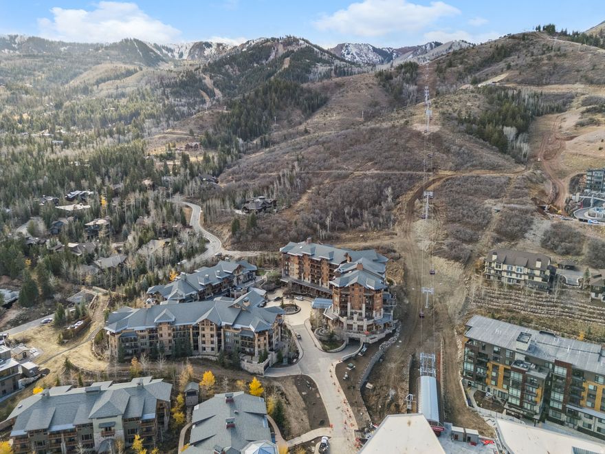 Welcome Home to 3558 N Escala Court, Unit 251, Park City UT This stunning ski-in/ski-out Hyatt Centric in the heart of The Canyons Village offers one of the largest single level floor plans in the complex, with 2,405 sq. ft., three bedrooms, and four baths. Fully furnished and designed with lockout capability for flexible use or strong rental income, the home features an open layout, a spacious living area, and four fireplaces that add warmth and mountain charm throughout. Conveniently located on the second floor of the Uinta building. The unit boasts four private decks overlooking a year-round waterfall flowing into the heated outdoor hot tub and pool-the perfect setting to unwind or entertain after a day on the slopes. Located in the heart of Canyons Village, this residence provides unmatched access to year-round adventure. Owners can now enjoy the brand-new Sunrise 10-person Gondola, which lands just to the south of the existing Red Pine Lodge, offering faster, more direct access to the upper mountain alongside the Red Pine Gondola and Orange Bubble Express. You're just steps from dining, nightlife, shopping, and all the amenities of the mountain village, including a fitness center, multiple hot tubs, and full-service ski valet.Combining modern mountain design, a premier location, and the enhanced convenience of the new gondola, this property stands out as an exceptional opportunity for both luxury living and high-performing investment in Park City..