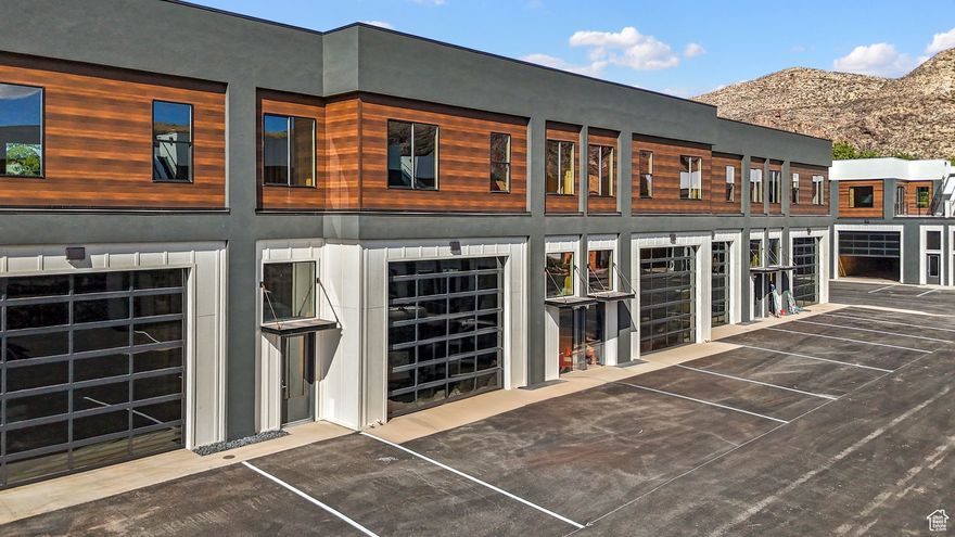 Nestled in the scenic beauty of La Verkin, UT, these versatile flex spaces offer a unique investment opportunity in one of southern Utah's fastest growing areas.  Strategically located near Zion National Park & bustling with potential, these modern, customizable spaces are perfect for entrepreneurs, creatives & businesses seeking a dynamic environment to thrive.  With a blend of small-town charm & proximity to major hubs, these properties are ideal for those looking to secure a foothold in an up-and-coming community. Units are offered as a 'gray' shell with 1800 sf of garage space (14x16 garage door & 62 ft deep), 1600-1800 sf on the 2nd level for office space, storage, etc., 300 sf of mezzanine & 800 sf of structurally supported rooftop patio.  HOA $125/mo & includes a putting green