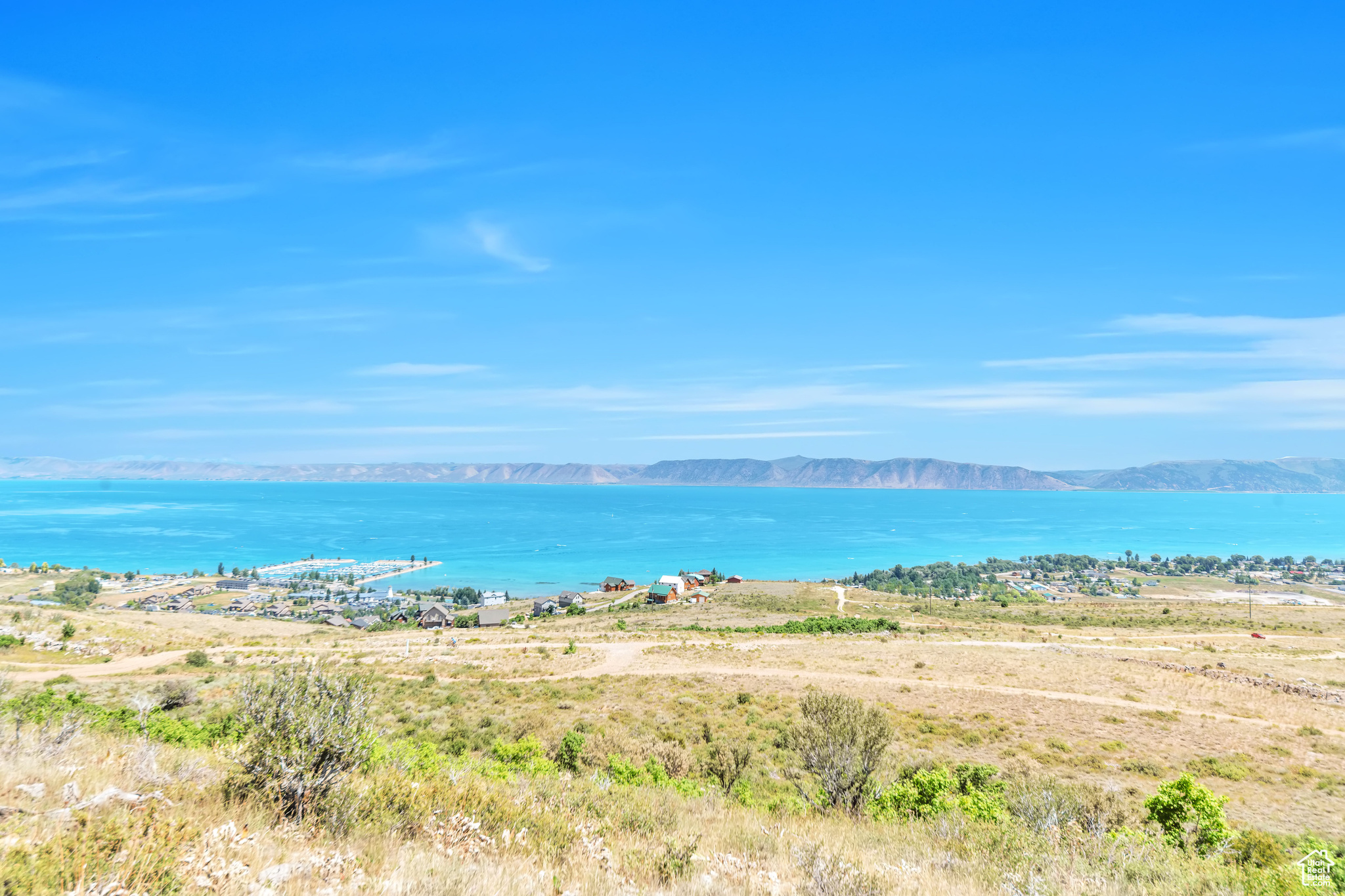 Great building lot with fantastic views!  Utilities stubbed to the lot., roads are paved. Lake view at Bear lake is a new community with a year round access and easy access to trails. This subdivision offers breath taking views and just minutes away from everything Bear lake area has to offer. Short term rental area
