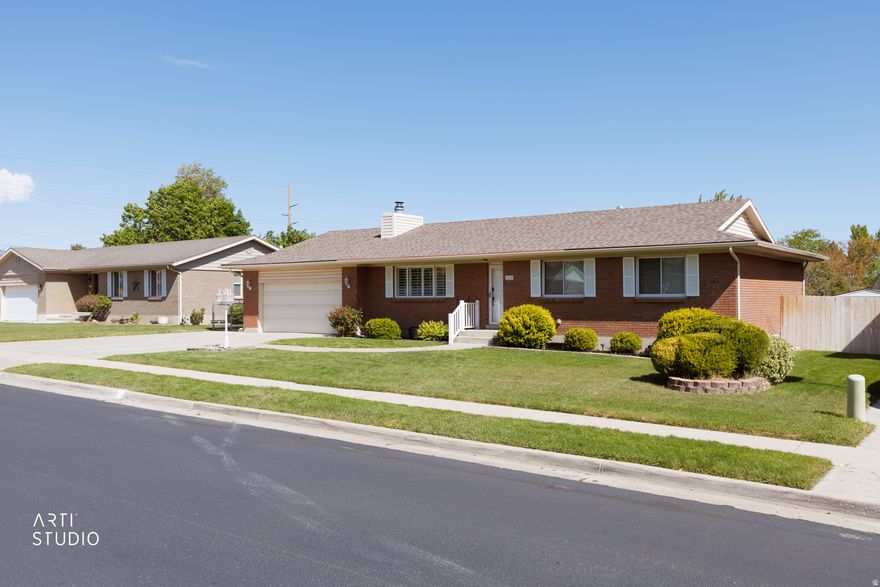 This well-maintained brick rambler sits in a prime location along the South JordanWest Jordan border. Thoughtfully updated and meticulously cared for, the home features tasteful finishes throughout. It offers five generously sized bedrooms, a comfortable main-level living room with a wood-burning fireplace, and a spacious family room in the fully finished basement-plenty of room for both daily living and gatherings. The oversized two-car garage provides excellent storage and parking. Outside, the nearly one-third-acre lot is set in a desirable neighborhood with mature trees, a well-kept lawn, and a south-facing orientation. The fully fenced backyard includes two storage sheds for added convenience. All kitchen appliances and a new water softener are included with sale. Check out the 3D tour and schedule your showing today!