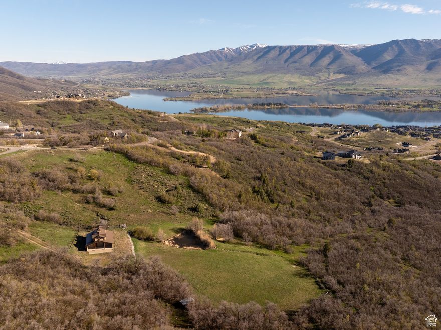 Situated near the top of scenic Old Snow Basin Road, this iconic 12.9-acre mountain property is a rare opportunity to own a slice of Utah's most breathtaking landscape. Surrounded by mature trees, open meadows, and panoramic mountain views, this land offers the perfect canvas to build your dream retreat. Whether you're envisioning a peaceful getaway, a family estate, or a legacy property, the natural beauty and privacy of this location let your imagination run free. The land provides the setting-serene, private, and inspiring. As an added bonus, a beautifully designed 2,500 sq. ft. three-stall barn sits quietly on the property-perfect for horses or simply enhancing the charm and functionality of this mountain escape All this just 3 miles from Pineview Reservoir and Huntsville, and minutes to world-class outdoor recreation, including Snowbasin Resort, Powder Mountain, hiking, mountain biking, ATV trails, and blue ribbon fishing. It's the perfect place for year-round adventure and lasting memories.