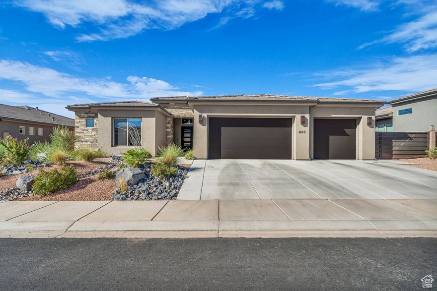 This stunning, beautifully maintained home feels like new, showcasing high-end finishes throughout. Step inside to tall ceilings, a grand entryway, and a spacious open concept with gorgeous red rock views from the front. Natural light and premium large tile flow seamlessly through the home, complemented by quartz countertops, ceiling fans in every room, and custom built-ins with a gas fireplace in the living room. The gourmet kitchen is a chef's dream with an oversized island and a walk-in pantry. The luxurious master suite features a spa-like bathroom with a freestanding soaking tub, walk-in shower with dual shower heads, dual vanity, extra storage, and a private entrance to the patio. The second bedroom has its own private bathroom, in addition to the Jack-and-Jill bedrooms with a shared bathroom offering convenience and privacy. Outside, the private fully fenced backyard overlooks Pine Valley and boasts a covered patio, artificial turf, professional landscaping with drip irrigation, and a relaxing hot tub for year-round enjoyment. Additional highlights include a spacious laundry room with sink, extra storage closets, a 3-car garage, and room for RV parking. Buyer to verify all information, deemed reliable, however buyer to verify all info including utilities, rental restrictions, and HOA information if applicable.