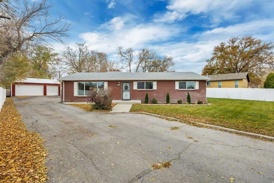 COMPLETELY REMODELED BRICK RAMBLER WITH 3-CAR GARAGE! Welcome home to this beautifully remodeled brick rambler featuring a 24' x 30' 3 car garage and countless upgrades throughout . The spacious kitchen boasts custom built-in cabinetry, granite countertops, and brand-new appliances, perfect for cooking and entertaining. Enjoy peace of mind with a newer roof, windows and HVAC system. This home is newly painted and has new carpet throughout. Relax in the inviting living room with a cozy woodturning fireplace, A large family room is perfect for parties or movie nights! You can step outside to your private backyard ideal for family gatherings. This lovely home offers comfort style and functionality in one complete package. Don't miss you chance call today to schedule you private showing.   Square footage figures are provided as a courtesy estimate only and were obtained from county records .  Buyer is advised to obtain an independent measurement.