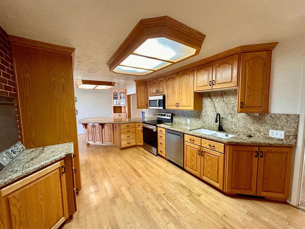 Photo of 185 W CLARK ST N, Grantsville, UT 84029 (MLS # 2122071)