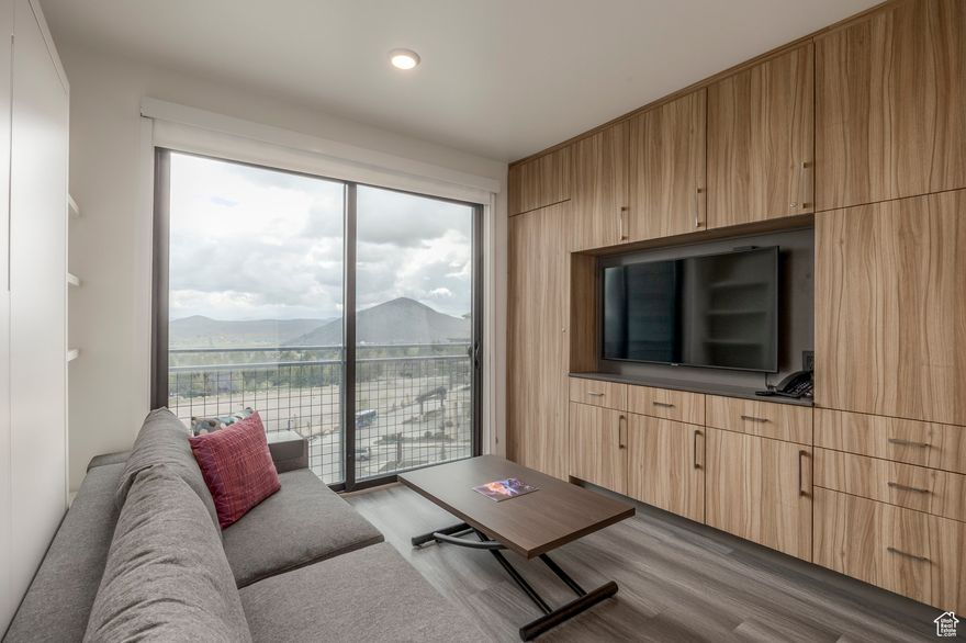 Located in the heart of Canyons Village, this fully furnished YOTELPAD studio offers the ultimate blend of modern design, efficient luxury, and mountain convenience. Sleek European finishes, custom-built transformable furniture, and high-end appliances elevate the smart, open-concept layout-comfortably sleeping up to four with a queen-sized Murphy bed and built-in bunks. Soaring 9-foot ceilings and expansive east-facing valley views fill the space with natural light and a sense of serenity. Ideal as a turnkey vacation home or income-generating rental, the residence includes quartz countertops, stainless steel appliances, and a stylish, fully equipped kitchen. Resort-style amenities include direct ski access via the Red Pine Gondola, outdoor pool and hot tub, steam room, fitness center, fireside lounge, game room, kids room, ski and parking valet, and 24-hour security. All just steps from world-class skiing, shopping, and dining. Discover effortless mountain living in one of Park City's most sought-after locations.