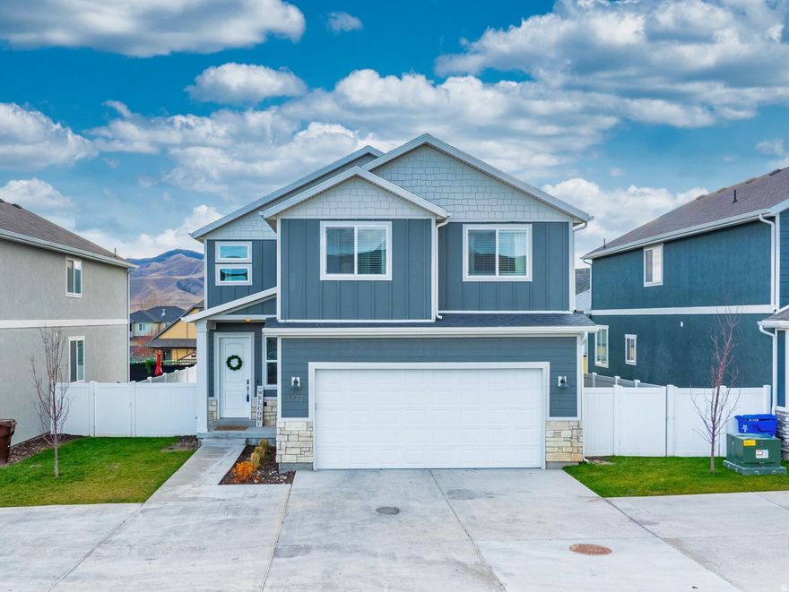 Welcome to the Eagle Mountain home that finally answers the age-old question: "Can I live on the golf course without fearing for my life?" Yes. Yes, you can. This 5-bed, 3.5-bath beauty sits right by the tee box-not the danger zone where golf balls come in hotter than your last DoorDash order. Even your sister who slices every shot like she's trying to cut down trees couldn't hit this house. You are safe. Inside, this place is CLEAN-clean. Like "did someone eat off these floors?" clean. Move-in ready, extremely well cared for, and absolutely dialed. The fully finished basement gives you extra space for movie nights, gaming, guests, or that home gym you'll definitely use (...for at least a week). Oh-and did I mention the solar panels? Your electric bill is cheaper than your last swig run! # BLESSED. And here's where your quality of life skyrockets: the HOA handles all landscaping. Just show up, relax, and soak in the million-dollar views of the entire valley. Zero effort required. Come check it out-your future self (and your golf-ball-free windows) will thank you.