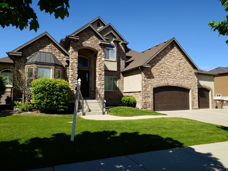 Beautiful home in established neighborhood with maple tree lined streets. New carpet in the entire home.  New paint in most of the home.   Just 4 minutes from the I-15 freeway.  Large open floor plan.  Fully finished basement with large built-in pool and deep RV parking.   With a theater room, pool, and huge family room, your family will create lasting wonderful memories for years to come.  Kids splash pad fountain next to pool.  New draper city park, play ground, soccer field and pickle ball courts being built now just 6 houses north of the subject home.