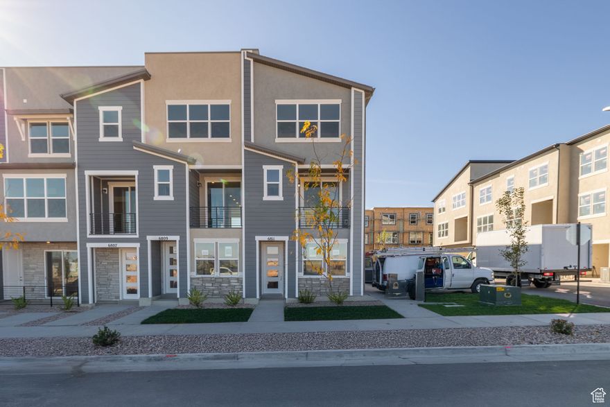 Welcome to Joshua Tree in Herriman, a vibrant townhome community where modern design meets effortless living. The Holland plan at Joshua Tree  a stylish 3-story townhome featuring 3 bedrooms, 3.5 baths, and 1,730 sq ft of thoughtfully designed living space. Enjoy modern finishes like granite countertops, stainless steel appliances, and 9' ceilings, plus a private deck. With energy-efficient features, a spacious primary suite, and landscaping maintained by the HOA, this home blends comfort, convenience, and low-maintenance living in the heart of Olympia.