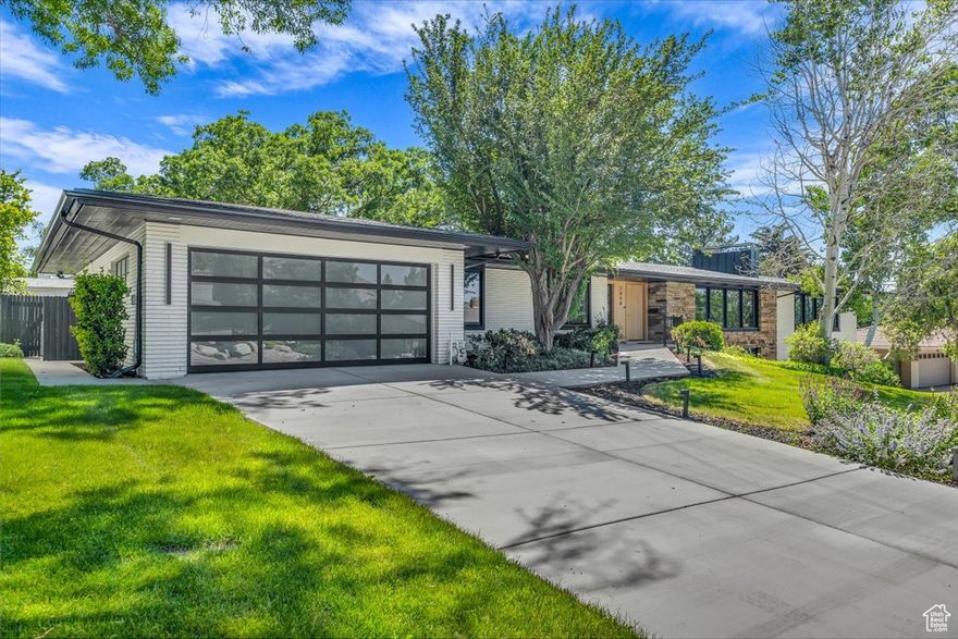 **WILL GO QUICK, MOTIVATED SELLERS OPEN TO ALL OFFERS & 300K BELOW APPRAISED VALUE** Experience modern luxury and functional living in one of Salt Lake City's most sought-after neighborhoodsSt. Mary's. This fully permitted, high-end remodel was thoughtfully designed to meet the needs of today's families, offering space, flexibility, and premium amenities throughout.  The home features a rare 4-car garage, expansive backyard with additional storage, and a layout that blends everyday comfort with upscale design. The main level offers single-level living with an open, sun-filled floor plan and a chef's kitchen equipped with top-of-the-line appliances. Additional features include a private home gym, custom theater room, and in-home sauna-making this home equally suited for entertaining or relaxing.  The finished basement includes a second kitchen and private entrance, creating the perfect setup for a mother-in-law suite, long-term guests, or multigenerational living.  Step outside to a spacious entertainment deck with mountain views ideal for gatherings or quiet mornings. Located just minutes from downtown Salt Lake City and with convenient access to top schools, trailheads, and world-class skiing, this home offers both lifestyle and location.  Offered significantly below recent appraised value. $15,000 in buyer concessions available-can be used toward closing costs, rate buydown, or other buyer needs. Square footage per recent appraisal; buyer to verify. Agent owned.