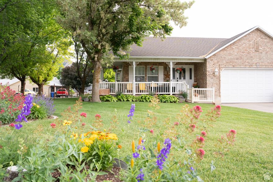 OPEN HOUSE NOV 1st, 10am - 12pm. One of a kind home in North Ogden. Beautiful brick, fantastic curb appeal, including a wrap around porch, beautiful landscaping, side driveway with a lot of parking space. Home updated in 2023 with new flooring throughout, and updated quartz counter tops in kitchen and main bathroom.   Newer shed and garden boxes, potential mother-in-law apartment, fire pit in back yard, small pond, mature trees, covered back patio, and beautiful mountain views. Large cold storage in basement and storage shelves in the garage. This home has been very well taken care of over the years. New Roof, gutters, and leaf guards in 2024.  Lot is in 3 different tax id numbers combined. 17-082-0003, 17-082-0129, 17-259-0008