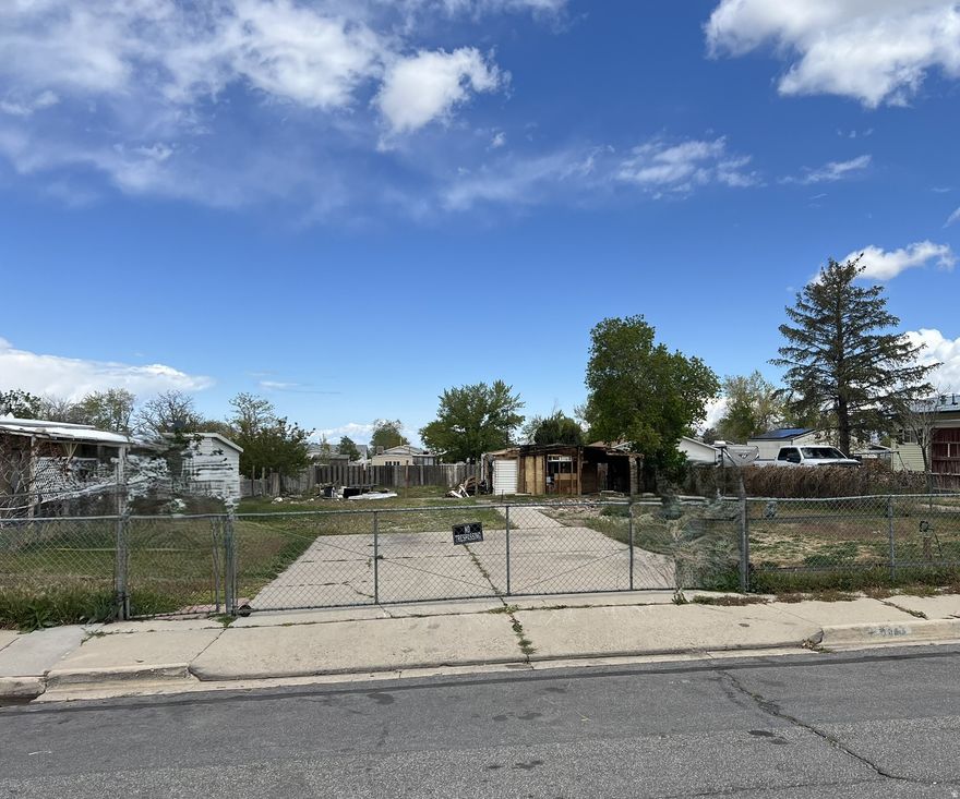 Nearly 1/3 acre fully improved building lot that previously had a manufactured home on it.  The manufactured home has been removed and the shed is in the process of being removed from the property. It should be gone in about 1-2 weeks. All utilities are in the lot. Zoned R1-7.