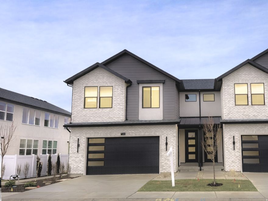 MOVE-IN READY and packed with upgrades. This beautiful new Twinhome in Trailside Reserve features the Brighton Traditional design package with warm oak-style cabinetry, quartz countertops, upgraded tile backsplash, LVP flooring, and stainless steel appliances. Enjoy a 2-car garage with EV charging, blinds throughout, and a fully fenced yard. Prime Midvale location just minutes from shopping and quick freeway access. Exceptional builder incentives available for a limited time. Visit the model home at 6760 S 300 E, Midvale, UT. Open MondaySaturday, 12pm6pm. Photos may vary by unit.