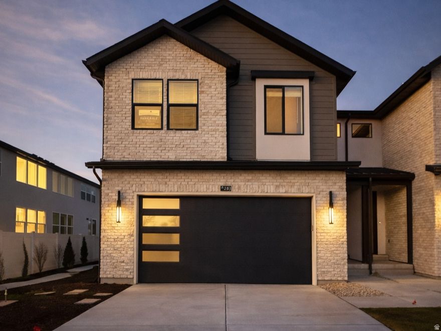 MOVE-IN READY and packed with upgrades. This beautiful new Twinhome in Trailside Reserve features the Brighton Traditional design package with warm oak-style cabinetry, quartz countertops, upgraded tile backsplash, LVP flooring, and stainless steel appliances. Enjoy a 2-car garage with EV charging, blinds throughout, and a fully fenced yard. Prime Midvale location just minutes from shopping and quick freeway access. Exceptional builder incentives available for a limited time. Visit the model home at 6760 S 300 E, Midvale, UT. Open MondaySaturday, 12pm6pm. Photos may vary by unit.