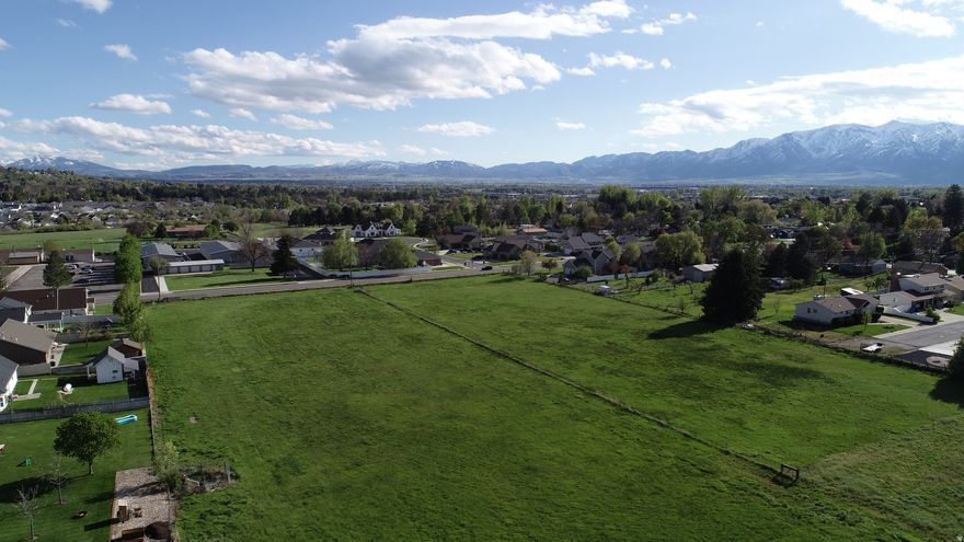 5.7 Acres with Public Road access, Utilities nearby, Beautiful River Heights Location. Sellers will not divide.