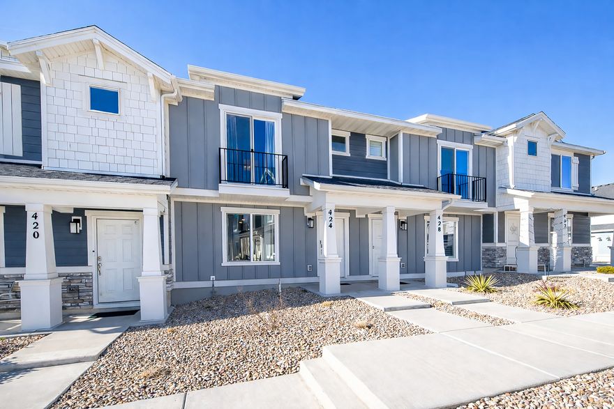 Welcome to 424 N Artesian Way-a move-in-ready home in Lehi's highly sought-after Cold Spring Ranch master-planned community. Ideally located just minutes from I-15 and Silicon Slopes, this home offers the perfect balance of convenience, comfort, and community amenities.  This beautifully designed residence features the popular Addison floor plan, complete with a 2-car garage plus a 2-car driveway, providing rare and valuable parking flexibility. Inside, you'll find an open and functional layout with spacious bedrooms and oversized closets, ideal for both everyday living and long-term comfort.  The main level is finished with laminate wood flooring throughout, complemented by white cabinetry and white quartz countertops that create a clean, modern aesthetic. The upgrades are already in place-no waiting, no builder delays-just unpack and enjoy.  Cold Spring Ranch offers resort-style amenities including a pool, clubhouse, and seven pickleball courts, all within a vibrant, well-maintained neighborhood. Whether you're commuting to work, enjoying nearby shopping and dining, or taking advantage of the community amenities, this home delivers exceptional value in one of Utah County's fastest-growing areas.  Clean, modern, move-in ready, and perfectly located-this is Lehi living at its best.  Square footage figures are provided as a courtesy estimate only and were obtained from the total square footage in the county records to estimate the top and bottom.  Buyer is advised to obtain an independent measurement