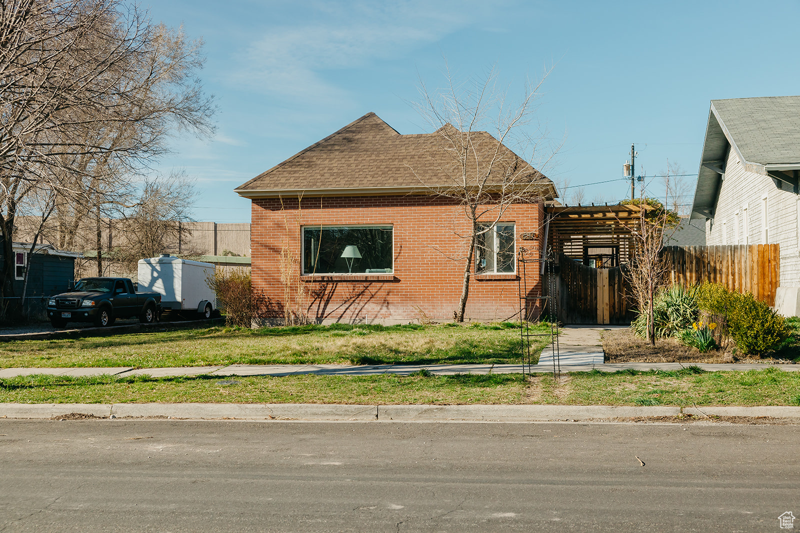 This home offers the best of both worlds-city convenience with a peaceful, retreat-like feel. Set on an oversized lot, you'll find space to slow down and reconnect with what matters. Enjoy a thriving vegetable garden, your own chickens, and an outdoor office that's fully equipped with A/C, heat, and electricity-ideal for remote work, creative projects, or a quiet escape.  Inside, the updates are done for you-fresh paint, updated flooring, and plenty of natural light throughout. The spacious family room is filled with warmth and sunlight, creating the perfect space for relaxing or gathering with loved ones. A semi-formal dining area flows into the kitchen, making everyday living easy and inviting.  Step out your front door and you'll find your new favorite spot: a covered patio with surround sound, misters, and total privacy. It's the perfect place to start your mornings or wind down in the evenings-no matter the season.  With three cozy bedrooms and one well-kept bathroom, this home offers just the right amount of space, wrapped in charm and comfort.  It's not just a home-it's a lifestyle. One that invites you to slow down, breathe deeper, and truly enjoy where you live.