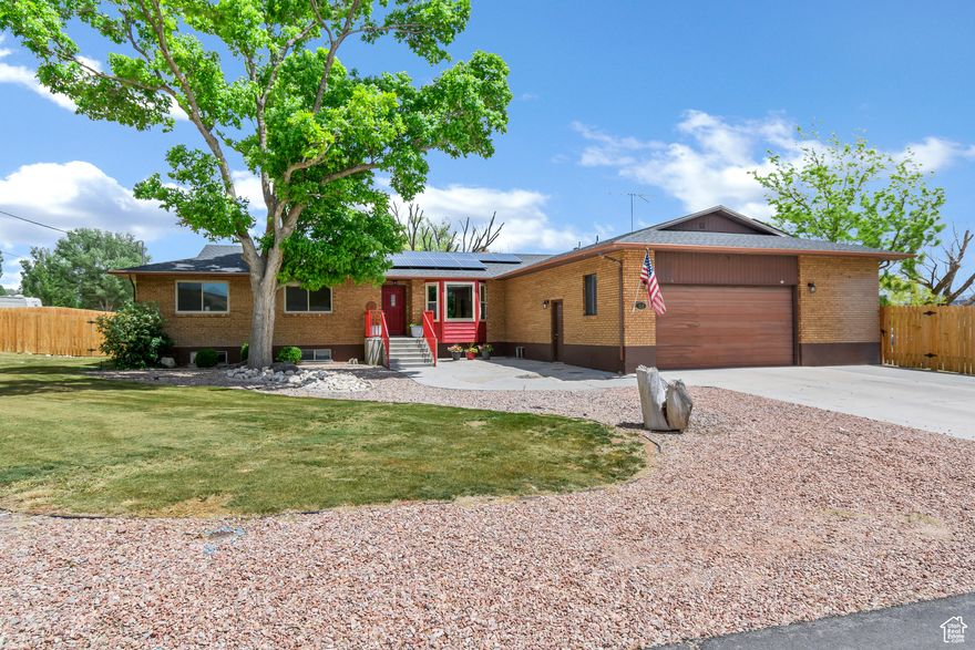 Spacious and updated 6-bedroom, 2.5-bathroom home offering 3,648 square feet of living space on a 0.54-acre lot in a prime Gunnison Valley location. This move-in-ready property features numerous recent upgrades including a new roof, owned solar panels, new windows, new carpet, and fresh interior paint, providing modern comfort and energy efficiency throughout. The functional layout offers ample room for everyday living and entertaining, while the partially fenced yard includes space for animals and a hot tub for year-round relaxation. Located right next to a scenic walking path, the home also sits just 10 feet from a separately deeded and fully subdivided 0.45-acre lot, which is not included in the sale but presents an excellent investment opportunity for future development, a second home, or long-term value. Please note, the green shed and the subdivided lot are excluded from the sale. Square footage figures are provided as a courtesy estimate only and were obtained from county records; buyer is advised to obtain an independent measurement.