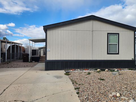 Photo of 3304 W BRADFORD PARK DR S #104, West Valley City, UT 84119 (MLS # 2141664)