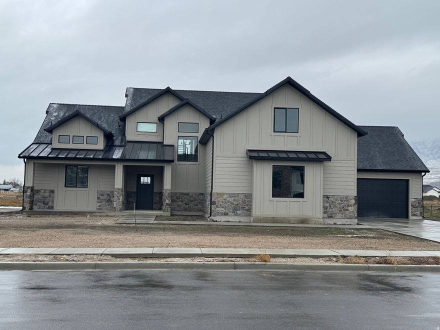 This is a Custom Buit Home by Gray Stone Development Inc.  Work directly with the builder.  A 2-Story with everything included in the price. Including: quartz  countertops, custom painted cabinets combined with stain. Spacious kitchen and butler pantry.  Extra-large kitchen island with 6cm quartz tops.  Upgraded tile  throughout the house with fun patterns.  Unbelievable finish work with accent walls throughout the house.  Barn door in the master bedroom.  2 sinks, free standing  tub, separate toilet room in the master bathroom, stackable washer and dryer in the master closet.  Large family room upstairs and also a bonus room that could also  be used as a bedroom to make a total of 5 in the house.  Main bath has tub and toilet separated to be more functionable. Laundry room upstairs for convenience.  The exterior of the home is  constructed of real stone.  This is a quality-built home.