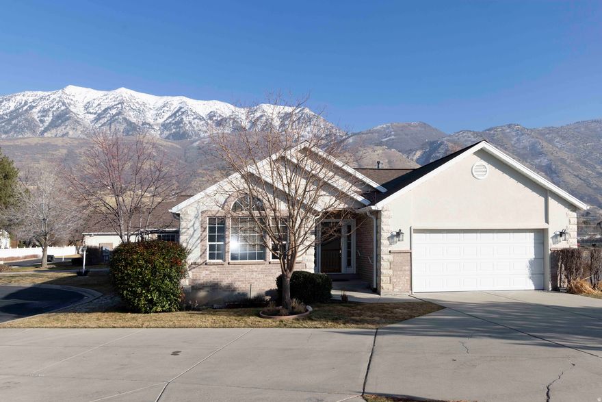 Rarely available home in the highly sought-after Edgemont area offers the convenience of single-level living with the added benefit of a fully finished basement. Enjoy beautiful mountain views through large, sunny windows throughout the home. The formal living and dining room provide an inviting space for entertaining, while the kitchen and family room just beyond offer a comfortable, relaxed setting for everyday living. The large owner's suite allows space for a private sitting area or small office. The finished basement includes three additional bedrooms, ideal for visiting family, hobbies, or flexible use. Step outside to the private patio with a retractable awning ,perfect for relaxing outdoors in comfort. With its thoughtful layout, flexible living spaces, and peaceful setting, this home presents a rare opportunity to enjoy main-floor living in one of Edgemont's most desirable locations. Sq ft fig provided as a courtesy estimate only and were obtained from County records .  Buyer is advised to obtain an independent measurement.