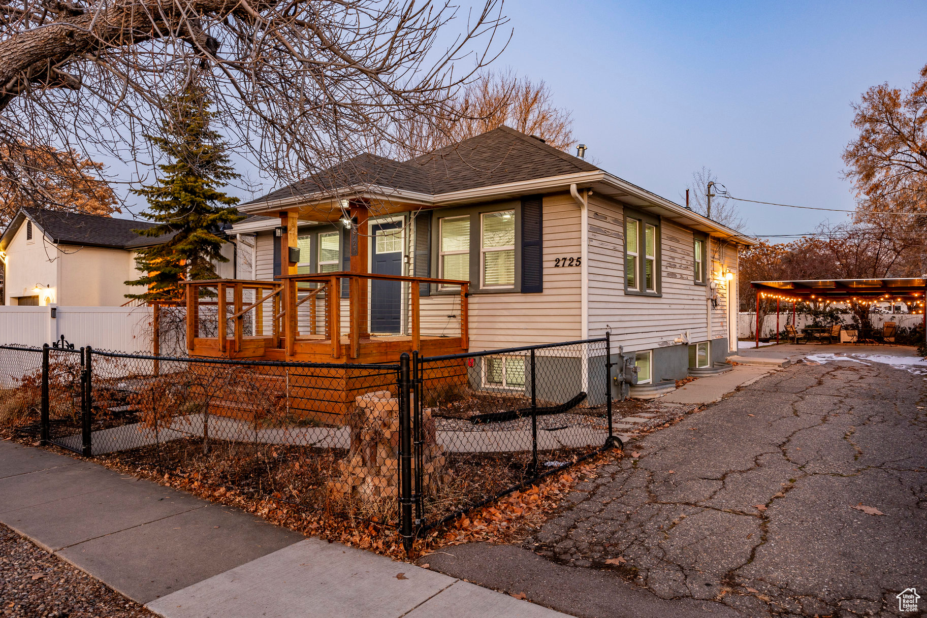 Discover the perfect blend of comfort, functionality, and style in this charming 1920's bungalow/cottage-style home in Millcreek. Completely customized and remodeled (exterior and interior) in 2016. Upon entering the iconic blue front door, you'll be greeted by an open concept living room, kitchen,convenientbreakfast nook, 1 bathroom, 1 bedroom, and a dining room/office (which can also be considered as another bedroom with a closet, the doors are on site and can be installed making the home a 5 bedroom home which is extremely hard to find in the area). From the custom kitchen cabinets, laminate flooring, granite countertops, and gas range/oven; entertaining comes easy. Downstairs, you'll find 3 more bedrooms, another bathroom, and another living room. Moving to the yard, you'll find a fully fenced front yard (including a gated/secured driveway), a modern craftsman front porch, and a xeriscape front yard with drip lines. The rear and back of the home are fully fenced, and you'll have plenty of room to spread out, relax, and entertain as you'll find a 2-car garage with a workshop bench, sizable grass lawn with sprinkling system, and a 4-car stand alonecarport that has proved to be incredibly versatile and makes for a great covered area a small boat, RV, or furniture and a fire pit. Nibley Park Golf Course is 2 streets away, Forest Dale Golf Course & Fairmont Park are only 2 minutes away, and the iconic Sugarhouse Park is less than 10 minutes away. Conveniently located with easy access to State Street and the freeway, this property is a great choice for those seeking a comfortable home or a promising investment opportunity.