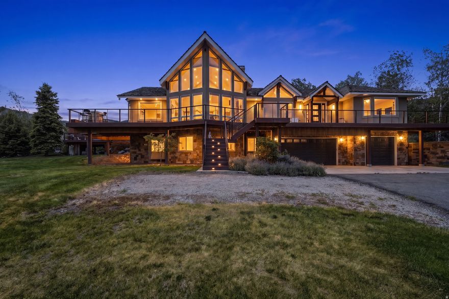 Incredible opportunity to own a one of a kind hobby farm/homestead with breathtaking panoramic views of the Heber Valley! This very special property boats 15 amazing acres that provides the ultimate in privacy, serenity, sustainability, and relaxation! Thoughtful owners have created a literal oasis that feels miles away from the daily hustle of the city, yet located just 8 minutes from the heart of Heber City, 15 minutes to Park City and world class skiing, and less than an hour to SLC International Airport.  The property consists of a beautifully maintained 4485 sq ft. main residence in a classic contemporary mountain design, an incredible custom designed 4000 square foot "Barndominum" with over 2500 feet of fully finished garage/storage/shop space on the main, and a stunning 1500 square foot upstairs ADU that is a must see, to believe. Designed to the "nines" this structure features a coveted, fire resistant Shou sugi ban exterior, Control 4 technology, Sonos Sound, heated flooring, a 34KW Solar System with Battery backup, electric vehicle charging station, 2 kitchens, built in high end appliances, custom cabinetry and built ins, massive shop storage racks system, and so much more! Expansive property also boasts a huge fully fenced and sustainable garden are with over a dozen raised garden beds, green house, chicken coop and shed plus a fenced separate "orchard" area for future farm animal friends. Entertainers will delight in the impressive, fully equipped outdoor kitchen with built in BBQ, fabulous in ground gunite swimming pool, and separate 6 person Arctic Spa. Take in the incredible views of Deer Creek Reservoir from the impressive, European inspired custom built pergolas perched above an oversized flagstone patio or the relax by the romantic, Corten steel outdoor gas fireplace.  Don't forget the detached art studio located on the north side of the property with views too incredible to miss!  3 separate parcels are being included in the sale for a total of 15 acres : Adjacent Lot # 5 -Tax ID 00-0004 -0555 at 1535 E.1800 N. and Lot #6 -Tax ID 00-0004 0563 at 1615 E. 1950 N.  Too many features to this incredible property to list here, please contact listing agent for additional details. Property is Shown by Appt ONLY.