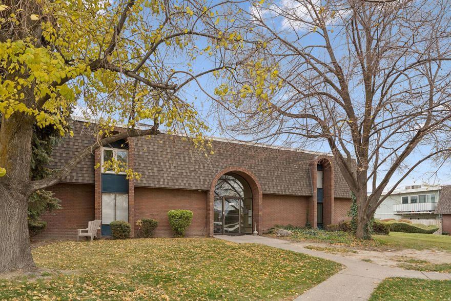 Looking for a life of convenience with single-level living and easy accessibility to shopping and restaurants, all while being in a private community? Congratulations, you found it! Welcome to the South 67 condos and a unit that is designed to make the flow of your day to day as simple as possible. A short walk from a reserved covered parking spot and the first unit to your left inside a secure building, this won't make move-in weekend or unloading groceries a strenuous chore. Step inside to an open floor plan with sizable kitchen and breakfast bar, perfect for serving up flapjacks or holiday buffets. Searching for a large living area to fit that monstrous sectional you've been eyeing? Look no further, plus a full bathroom and bedroom big enough for a California king is right around the corner. Don't miss the bonus walk-in closet and rare in-unit laundry! Say hello to a well-maintained blank slate that is eager for its new owner.