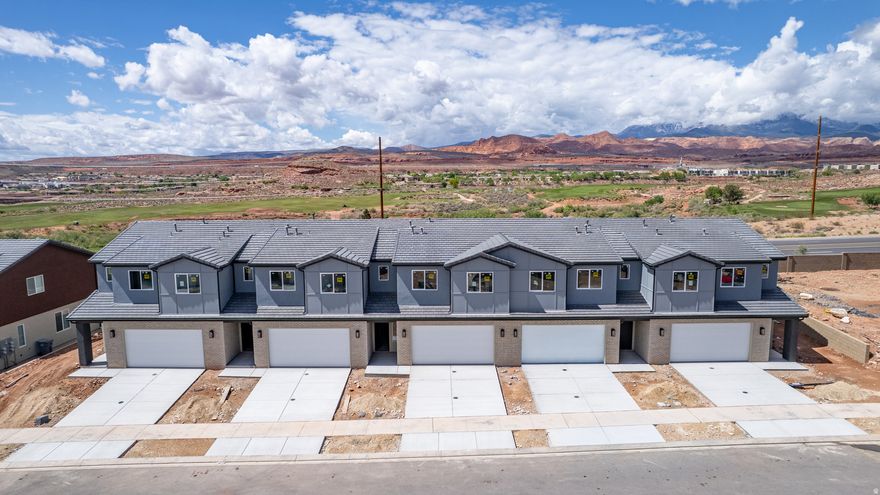 Welcome to the Sunburst, a beautifully crafted 2-story townhome featuring 3 bedrooms and 2.5 bathrooms within 1,843 square feet of refined living space. The standout feature of this home is the versatile loft, perfect for creating a second living area or enjoying family movie nights. Two of the bedrooms offer spacious walk-in closets, while the primary suite boasts a sleek Euro glass shower and dual vanity for an elevated bathroom experience. Designed to simplify everyday living, the Sunburst features a conveniently located second-floor laundry room, along with a 2-car garage and high-end finishes, offering an elevated living experience in the sought-after Coral Canyon community.