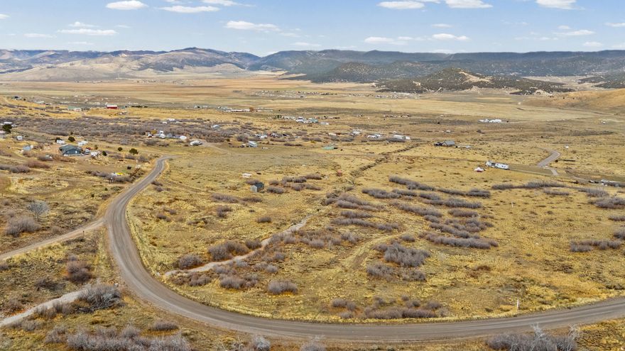 Experience easy off-grid living on this fully improved 5-acre lot in Oaker Hills. This property offers immediate usability with two-level RV pads, a 500' private well, a septic system, and year-round access. The setting is peaceful and private, just off Highway 89, with open skies and beautiful mountain views. This is an ideal setup for a weekend retreat, future homestead, or a place to build when the timing is right. Outdoor recreation is all around you, with space for ATV riding, hiking, hunting, and exploring the surrounding terrain. Build whenever you're ready, or enjoy it exactly as it is. With low HOA and light restrictions, you'll have the freedom to create your own space while staying close to major access routes. A rare opportunity to own a turnkey, fully prepared property with room to create your vision. Coordinates: 39.74975, -111.51975