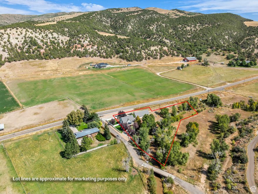 Welcome to your private slice of paradise in the peaceful heart of Coalville! Nestled on 1.02 acres and backing directly onto Chalk Creek, this charming rambler-style home offers the perfect blend of mountain serenity, functional living, and unique character. 2 bedrooms on the main level, 3 total bathrooms, a bunkhouse studio apartment with a separate entrance,  she shed on the deck overlooking the creek, 2-car garage, plus parking for all the outdoor toys, and a whole lot of wow! 1,313 SQFT Main home plus a 654 SQFT Bunkhouse studio apartment (Total: 1,967 SQFT). The main level features a light-filled, open floor plan with 2 spacious bedrooms and 2 bathrooms, complemented by gorgeous mountain views and the soothing sounds of the creek just beyond your backyard. A large deck offers the perfect perch for morning coffee or evening relaxation  complete with a she shed that overlooks the water, ideal for an art studio, reading nook, or quiet getaway. Downstairs, you'll find a Bunkhouse studio apartment, fully equipped with a second kitchen, full bath, and its own living area  perfect for guests, rental income, or multi-generational living. Whether you're looking for a full-time residence, a vacation home, or an income-producing property, this one-of-a-kind home offers endless potential in a truly special setting. Just minutes from Echo Reservoir, Park City, and I-80, yet tucked away in your own quiet corner of nature. Don't miss this rare creekside gem  schedule your private showing today!