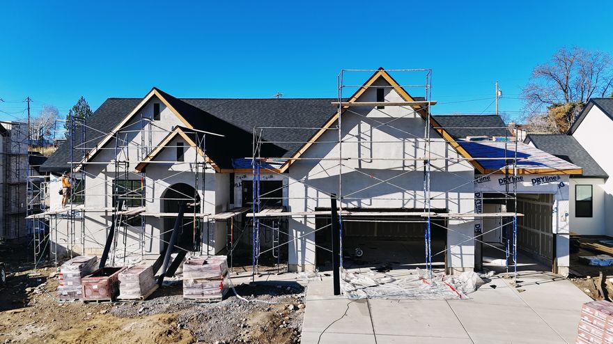 The Eleanor Rambler Floor Plan Experience luxurious main floor living with the beautifully designed Eleanor Rambler. This home features expansive common areas perfect for entertaining, with a spacious great room, kitchen, and dining area that seamlessly flow together. The gourmet kitchen is a chef's dream-outfitted with a commercial-grade gas range, built-in fridge/freezer combo, and ample counter space for culinary creations. Enjoy added privacy with a thoughtfully designed layout that places the master suite on the opposite side of the home from the additional bedrooms. The master retreat includes his and hers walk-in closets and a spa-inspired bathroom. Double deep 3rd car garage. Located next to Fox Hollow Golf Course. Completion at end of January 2026. Schedule your personal tour today. 20K preferred lender incentive.