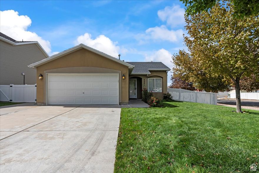 Welcome to this inviting 3-bed, 2-bath single-level rambler, perfectly set on a spacious corner lot in a quiet, established neighborhood. Inside you'll find new carpet, a bright, open layout, and comfortable spaces ready to call home. Enjoy the covered patio and fully fenced yard-ideal for relaxing, entertaining, or pets. A brand-new roof with a transferrable warranty adds peace of mind.  Move-in ready and waiting for you. Schedule a showing today.