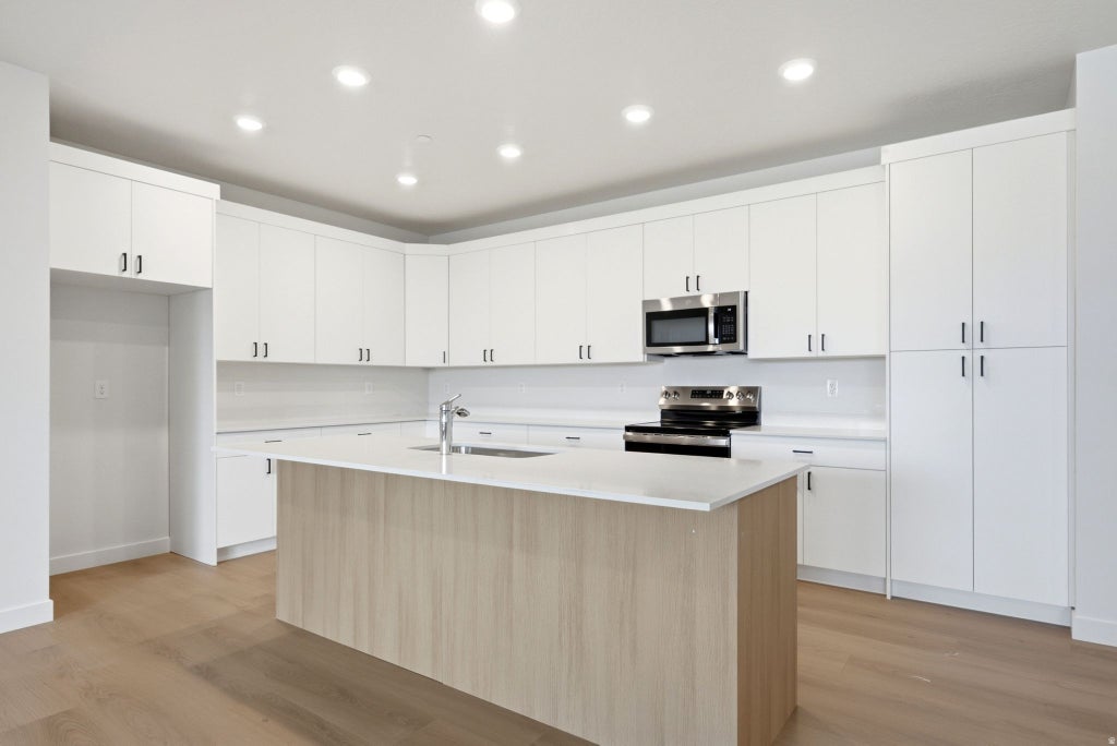 Photo of 717 W COHO LN S #204-2F, Midvale, UT 84047 (MLS # 2181995)