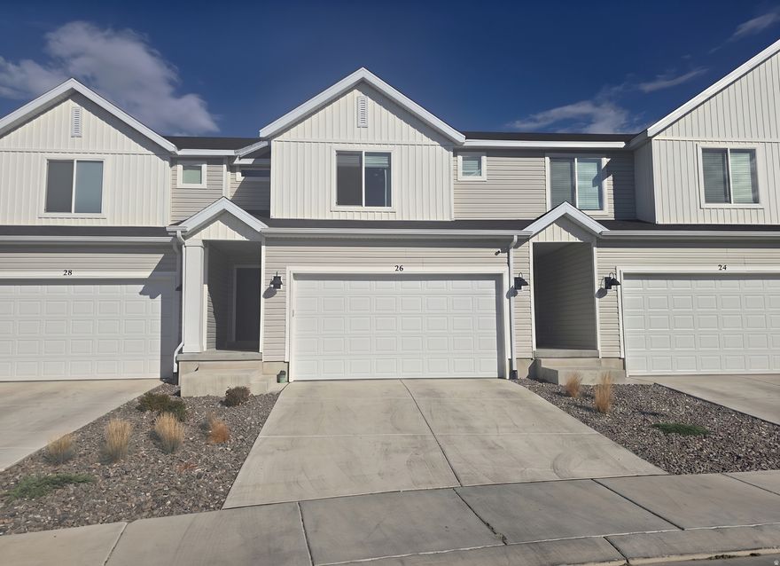 LIKE NEW! 100% move in ready, all appliances included! Enjoy this cute town home with large open kitchen/family area, enclosed patio, large bedrooms with primary suite and his & hers closets. EV charger included and ready to use! Includes washer, dryer, kitchen fridge, water softener, water filtration system, and more!!